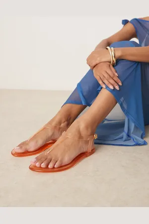 ASOS Sandalias naranjas con tira de dedo de goma Float de