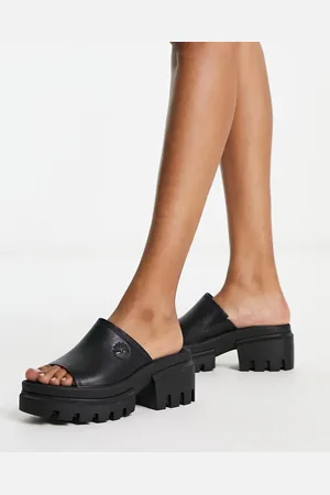 Timberland Sandalias negras tipo mules de cuero granulado Everleigh de -Negro