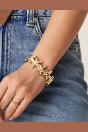 Accessorize Pulsera dorada con diseño de estrellas de mar de