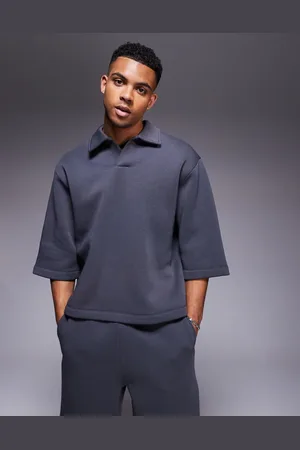 ASOS Sudadera extragrande de manga corta con cuello estilo rugby de