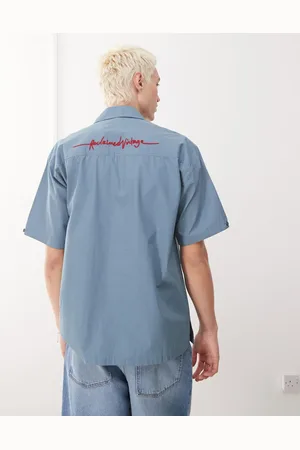 Reclaimed Camisa de manga corta y corte cuadrado con bordado trasero de