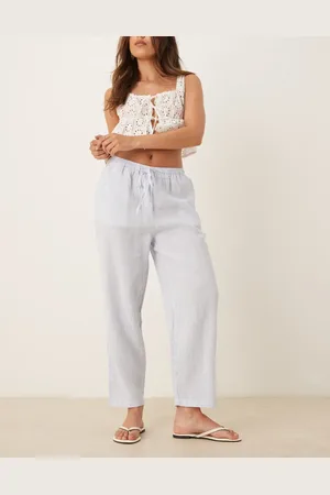 MANGO Pantalones azules con lazada en la cintura de lino de