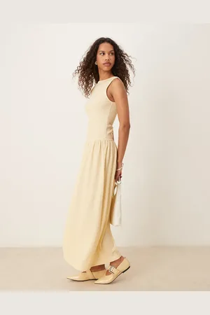ASOS Vestido largo amarillo pastel texturizado con cintura caída de -Blanco