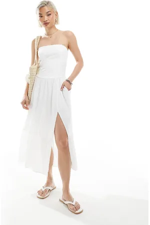 Hollister Vestido midi sin tirantes de cintura baja con abertura y acabado texturizado de