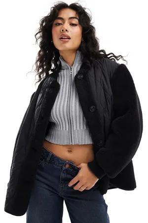 ASOS Chaqueta negra acolchada con diseño dividido de borreguito de -Sin color