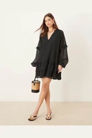 Pretty Lavish Vestido corto de manga larga con volante de