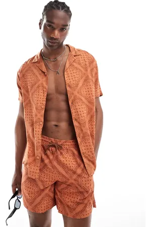 Hunky Trunks Camisa playera color óxido con estampado romboidal de cachemir de (parte de un conjunto)-Caoba