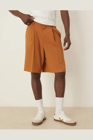 ASOS Pantalones cortos de traje color óxido de corte ancho de tejido efecto lino de -Naranja
