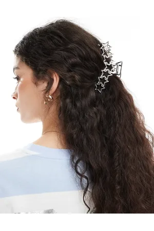 Monki Pinza para el cabello plateada con diseño de estrellas de metal de