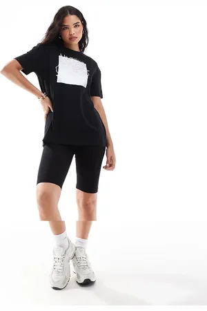 Threadbare Conjunto de camiseta extragrande con estampado de flor y pantalones cortos de