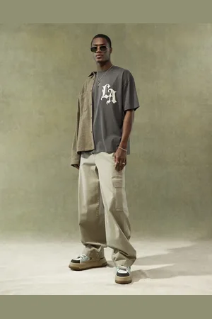 ASOS Pantalones beis cargo muy holgados con cinturilla elástica de -Beis neutro