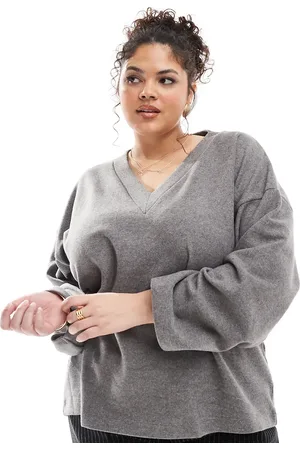 ASOS Jersey extragrande con cuello de pico de punto supersuave de ASOS DESIGN Curve