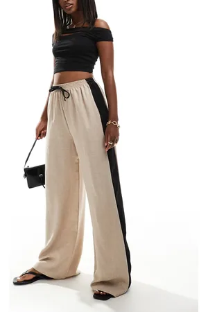 Reclaimed Pantalones de sastre de pernera ancha con franja lateral de - neutro