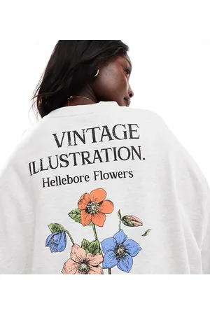 ASOS Sudadera jaspeado extragrande con estampado floral de ASOS DESIGN Curve