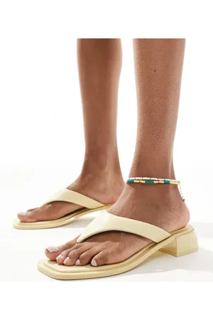 ASOS Sandalias amarillo pastel estilo mules de tacón con tira de dedo Finale de -Neutro