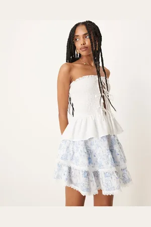Gina Tricot Minifalda azul de estilo bohemio con estampado floral y volantes escalonados de