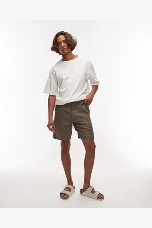 ARKET Pantalones cortos marrón topo lisos con bolsillos delanteros oblicuos de lino de