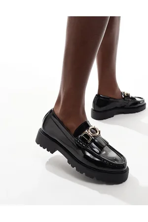 New Look Mocasines negros con borlas y suela gruesa de