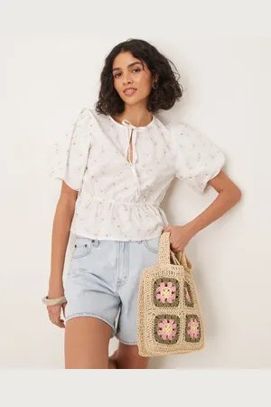 Gina Tricot Blusa con , mangas abullonadas y lazada delantera de -Blanco