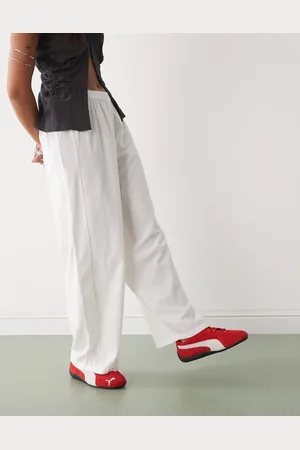 COLLUSION Pantalones blancos de corte bombacho holgado de lino de