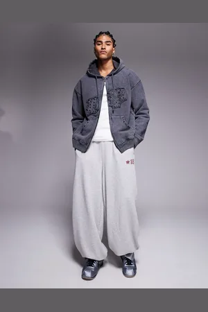Liquor N Poker Sudadera extragrande con capucha y logo con aplique de parche y tachuelas de