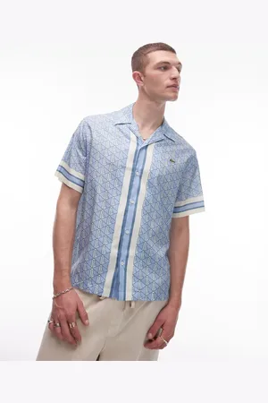Lacoste Camisa y blanca de manga corta con cuello de solapas y estampado integral de monograma de