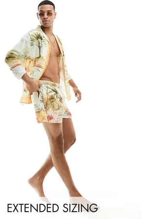 ASOS Shorts de baño cortos con estampado tropical de (parte de un conjunto)
