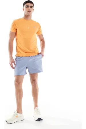 New Balance Pantalones cortos de 5" azules Essentials de
