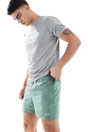New Balance Pantalones cortos de 5" verdes Essentials de