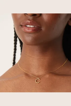 Accessorize Collar con diseño retorcido de la letra "C" chapado en oro con perla Z de