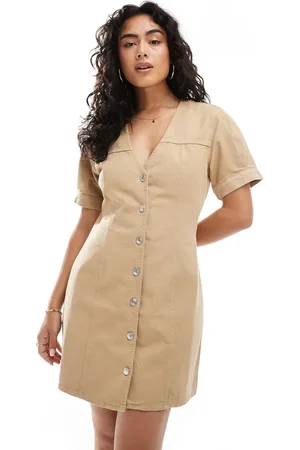 ASOS Vestido vaquero corto abotonado con mangas abullonadas de -Neutro