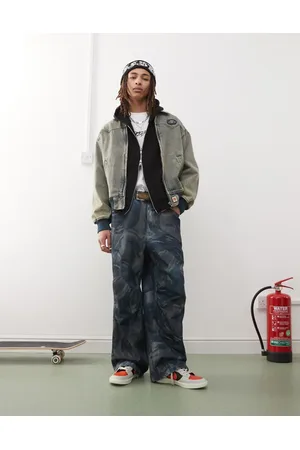 A Bathing Ape Vaqueros de corte suelto con lavado y patrón de jacquard de
