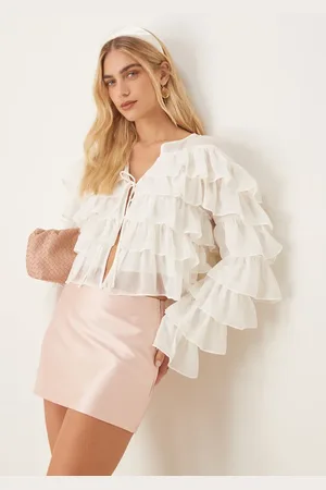 Gina Tricot Blusa corta blanco hueso de manga larga con volantes fluidos y lazada delantera de