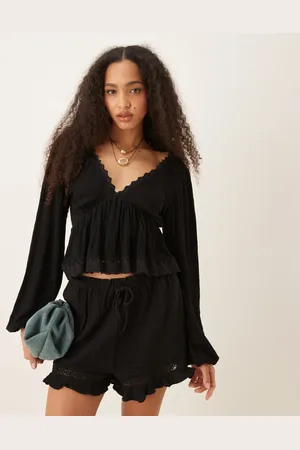 ASOS Top de tejido rugoso con mangas globo, lazada en la espalda y ribete de encaje de