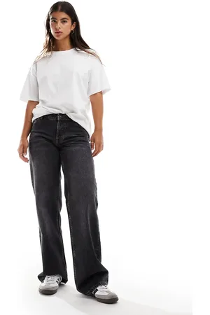 Topshop Vaqueros de talle bajo y pernera ancha con lavado negro deslucido Ember de Hourglass
