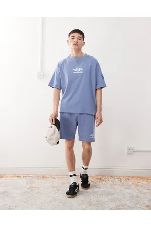 Umbro Pantalones cortos azules con bordado del logo Drill de