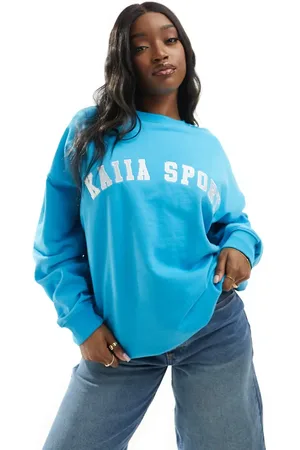 Kaiia Sudadera luminoso con logo deportivo de
