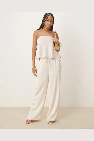 Six Stories Pantalones blanco de pernera ancha con lazada en la cintura de satén de (parte de un conjunto)
