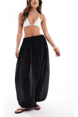 Pieces® Pantalones playeros negros de talle alto y estilo harem de