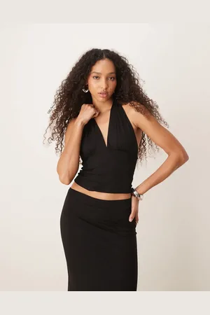 Gina Tricot Top ceñido con cuello halter y espalda baja de tejido suave de (parte de un conjunto)