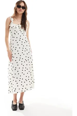 New Look Vestido midi color crema con estampado de lunares y tirantes de volantes de -Blanco