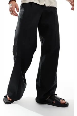 ASOS Pantalones de vestir negros de corte suelto con pinzas delanteras de mezcla de lino de