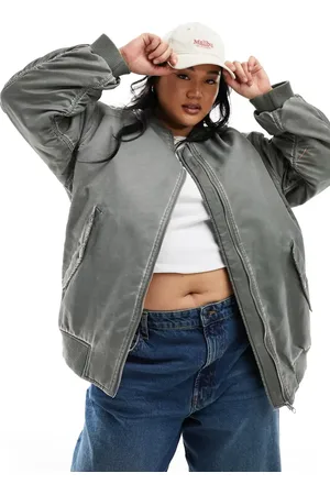 ASOS Chaqueta bomber extragrande con lavado ácido de ASOS DESIGN Curve-Negro