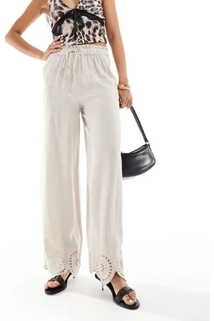 River Island Pantalones color con bordado inglés de lino de -Beis neutro