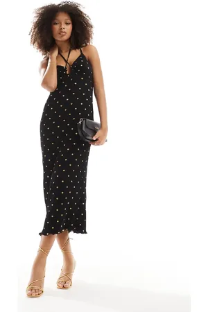 Never Fully Dressed Vestido semilargo plisado con detalle cruzado en el cuello y estampado de motas doradas de