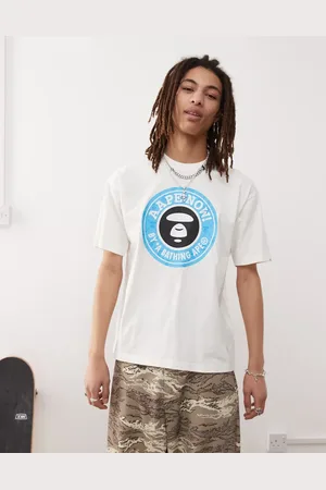 A Bathing Ape Camiseta blanco hueso con logo estampado en el pecho de