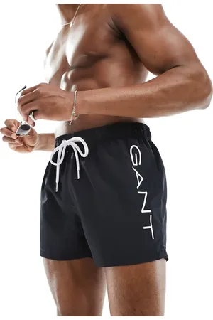 GANT Shorts de baño negros con logo de texto en el lateral de