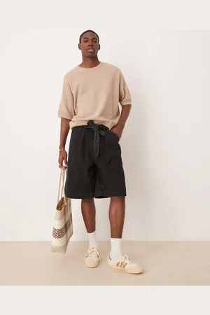 ASOS Pantalones cortos vaqueros negro lavado de corte alargado con pinzas y detalle anudado de