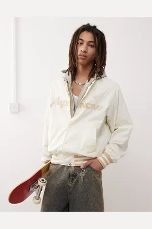 A Bathing Ape Chaqueta bomber blanco hueso con logo universitario de