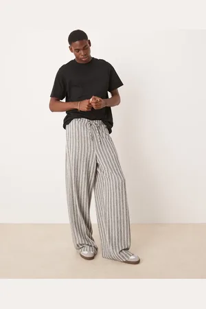 ASOS Joggers jaspeado a rayas muy holgados de felpa de rizo de